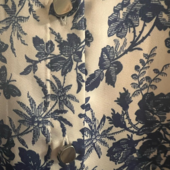 A beautiful button-up blouse to dress up or go casual. Navy & white floral. - Picture 3 of 8